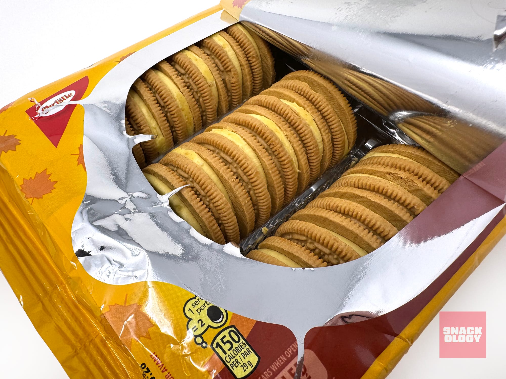 An open package of Oreo Maple Creme cookies