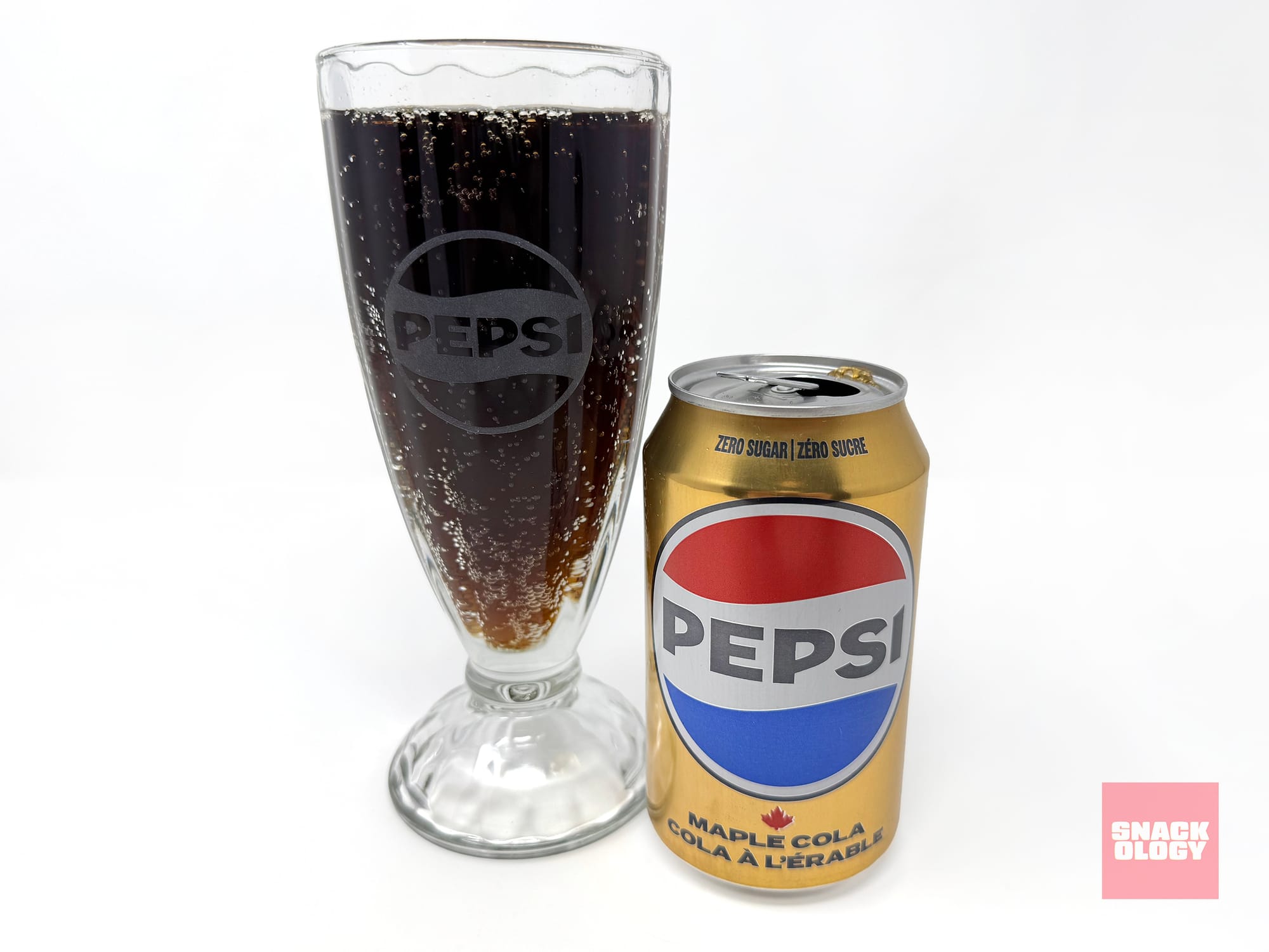 A Pepsi Zero Sugar Maple Cola poured into a glass